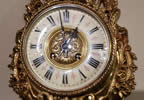 Ormolu 8 Day striking Cartell Clock