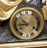 French gilt bronze & patinated bronze Mantle Clock