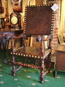Studded walnut and leather clad throne chair